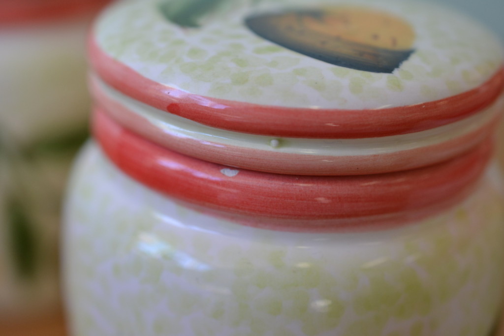 Vintage four Italian strawberry ceramic canisters