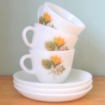 Vintage Milk glass tea cup and saucer yellow flower