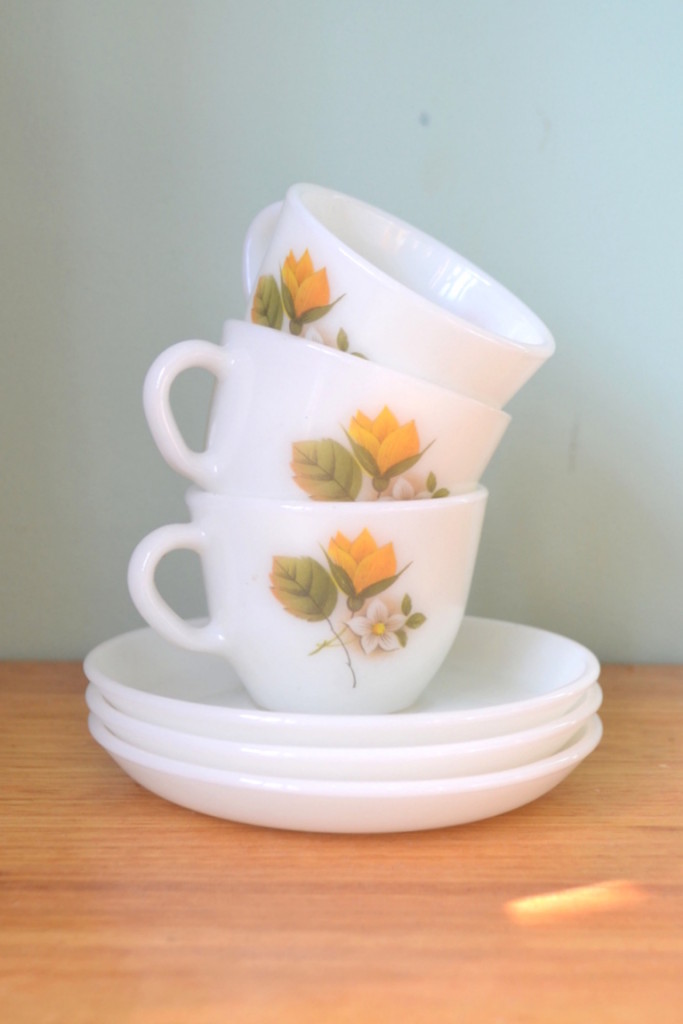 Vintage Milk glass tea cup and saucer yellow flower