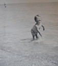 vintage black and white photo toddler at the beach
