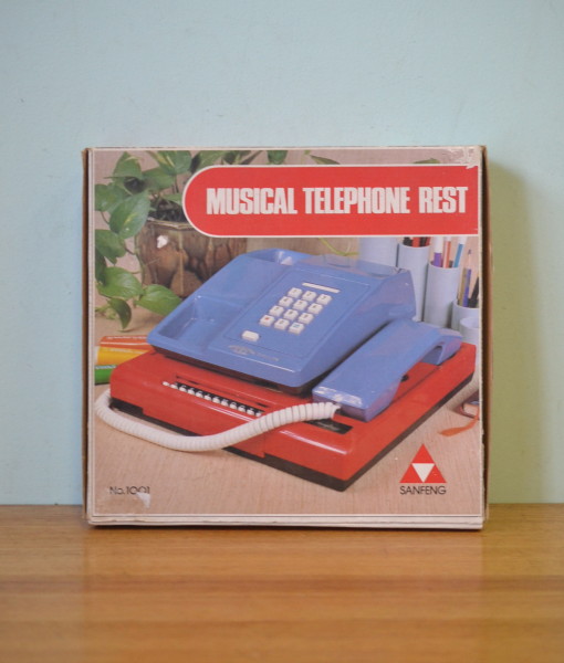 Vintage Kitsch musical telephone rest directory green
