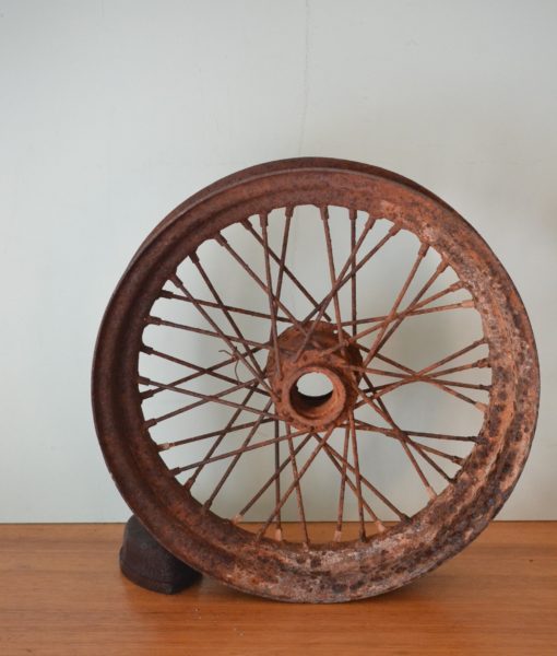 Antique cast iron spoked wheel