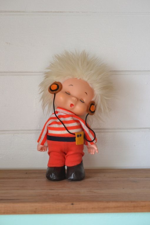 Vintage automative wind up musical doll head phone funky