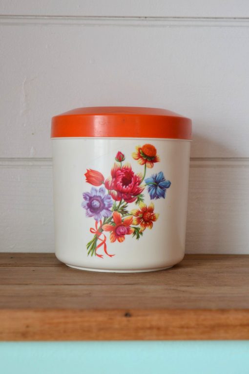 Vintage British Plastics orange canister flowers