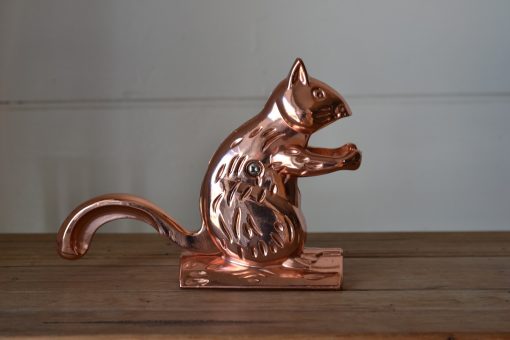 Anodised metal squirrel nut cracker rose gold