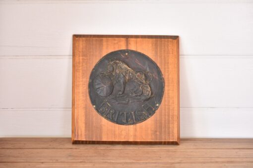 Antique tin plaque British lion mounted on wood
